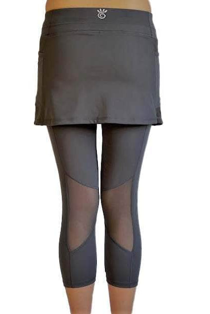 Studio shot of model from waist down in 2-1 Original Skirted Mid-calf Length Leggings in Steel from back