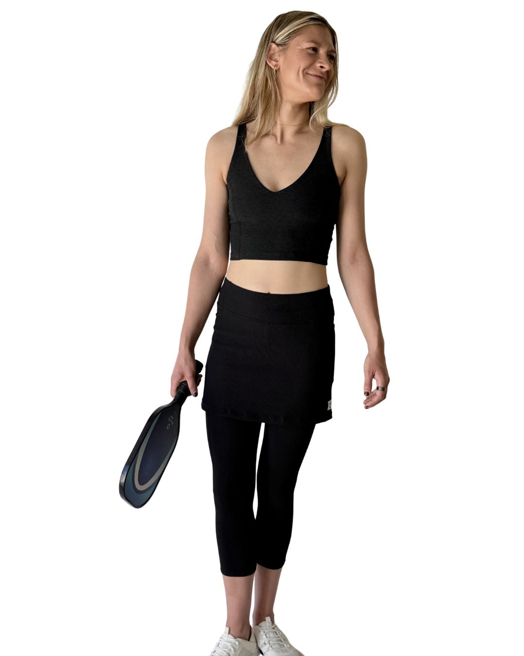 Woman in Black Skirted Leggings for golf, tennis, pickleball, hiking and yoga