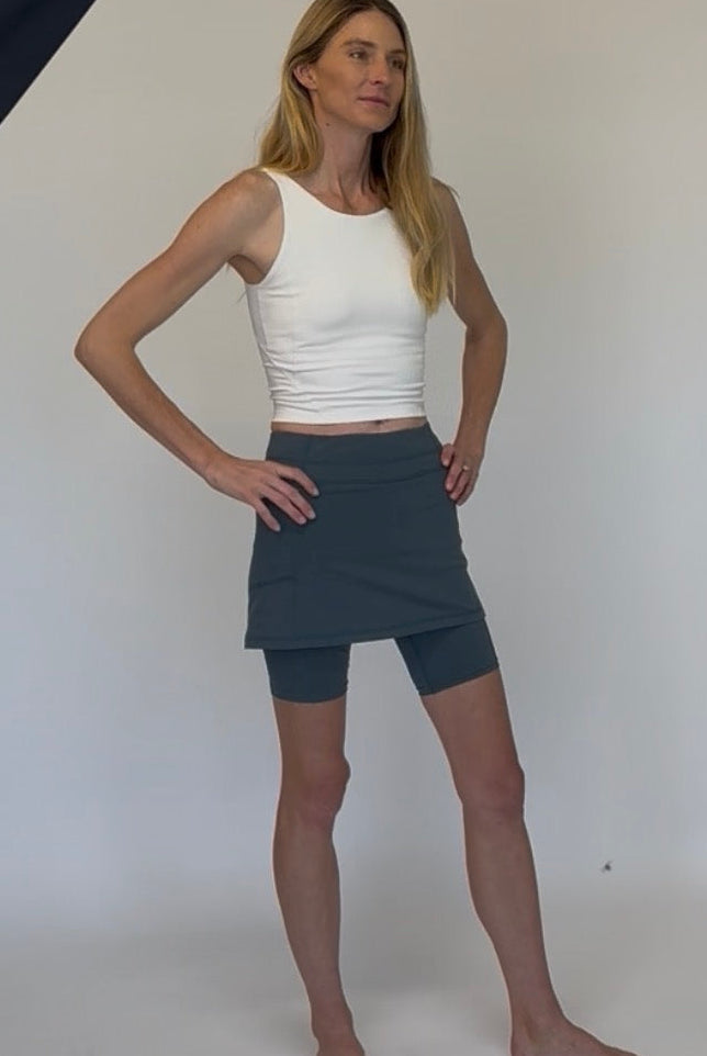 Model in Studio wearing Blue Cotton Bike Skirted Shorts