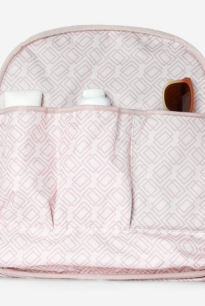 Interior pockets of tennis backpack showing three built in slots.