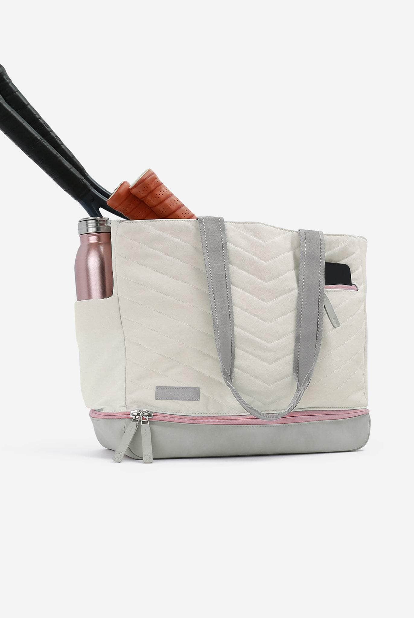 Designed for ladies who play both tennis and pickleball
Holds an average amount of gear
Holds up to 2 racquets and 2 paddles simultaneously
No-tip design keeps the bag upright and stable when set down
Thoughtfully designed with specific compartments for effortless organization
Crafted from premium fade-proof and water-resistant materials