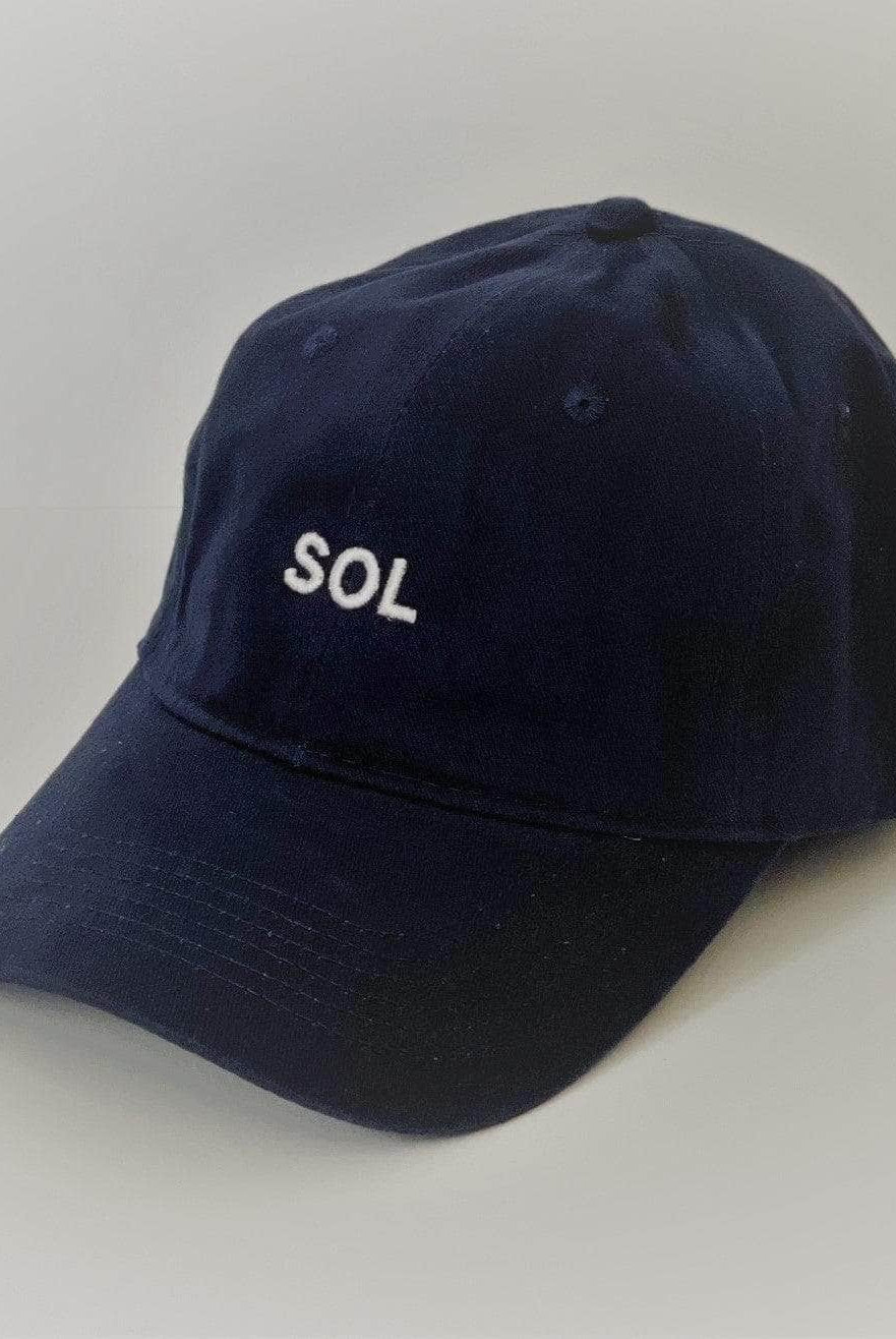 Studio shot of Navy Blue Cap - Sol Sister Sport
