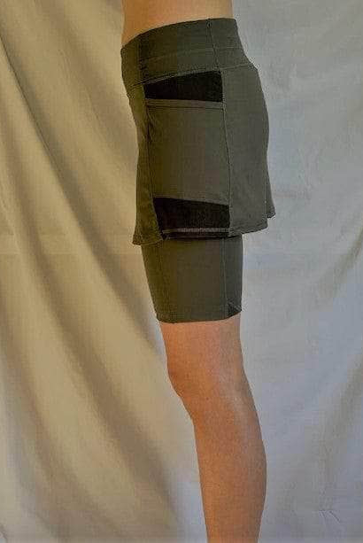 Studio shot of an Olive Bike Skort - Bike and Skater - Short and Sassy! - Sol Sister Sport