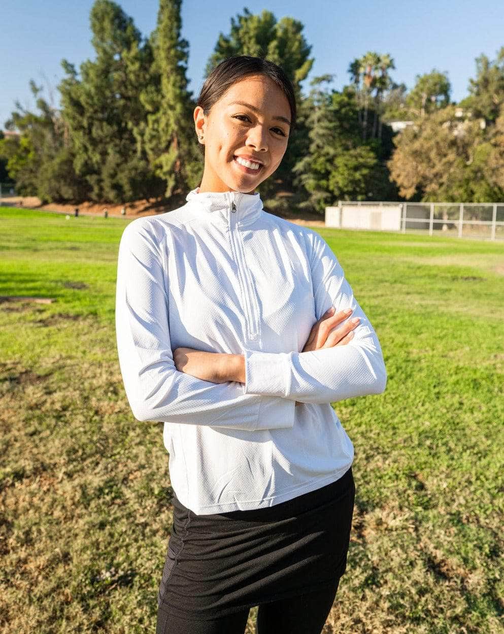 Lightweight Long-sleeve 1/4 Zip Shirt in White - Sol Sister Sport