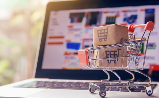 A shopping cart displayed on a laptop, symbolizing shopping for athletic wear online.