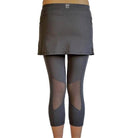 Studio shot of model from waist down in 2-1 Original Skirted Mid-calf Length Leggings in Steel from back