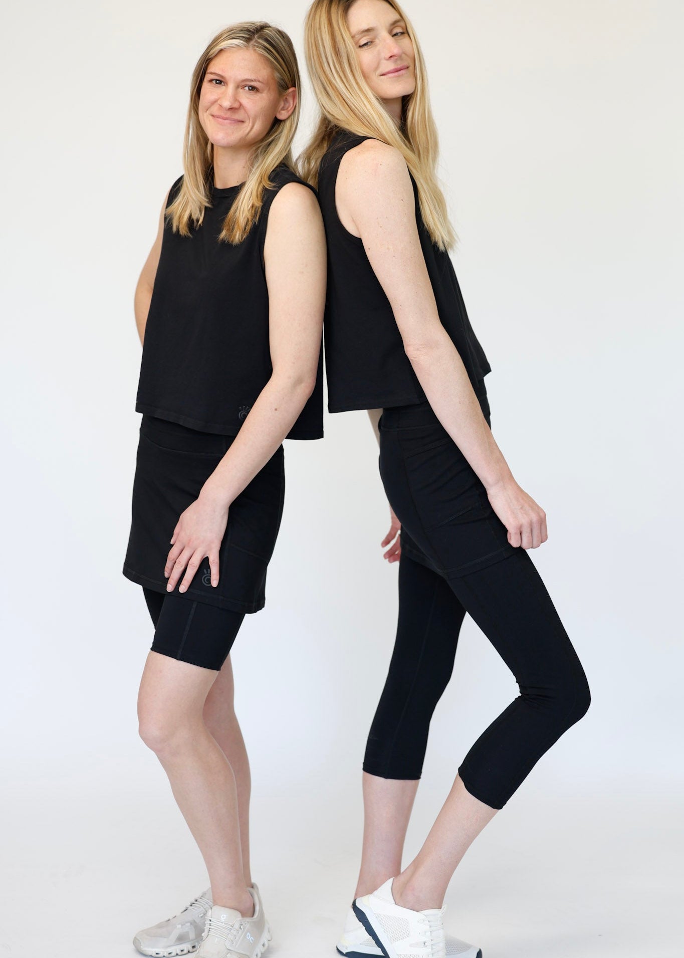 Two women wearing Black Cotton Skirted Leggings