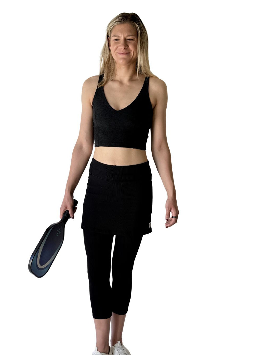 Woman in Black Midcalf Skirted Leggings for golf, tennis, pickleball, hiking and yoga