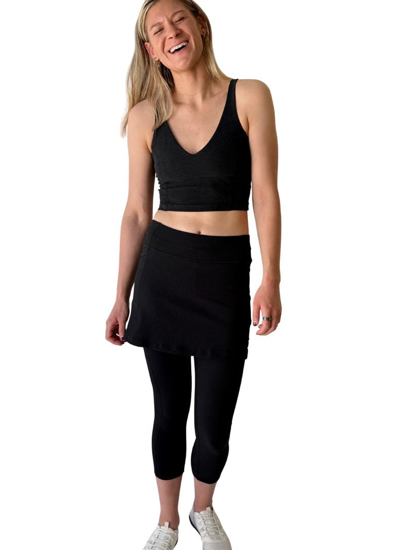 Woman wearing a Black Skirted Leggings for golf, tennis, pickleball, hiking and yoga
