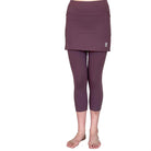 Studio shot of model from waist down wearing Elderberry 2-1 Skirted Ankle-Length Leggings from front