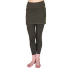 Studio shot of Model wearing 7/8ths length pretty olive skirted leggings - waist down from front.