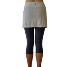 Waist down from back photo of 2-1 Skort Capris Leggings - Leggings are heather blue and attached skirt is white nylon.