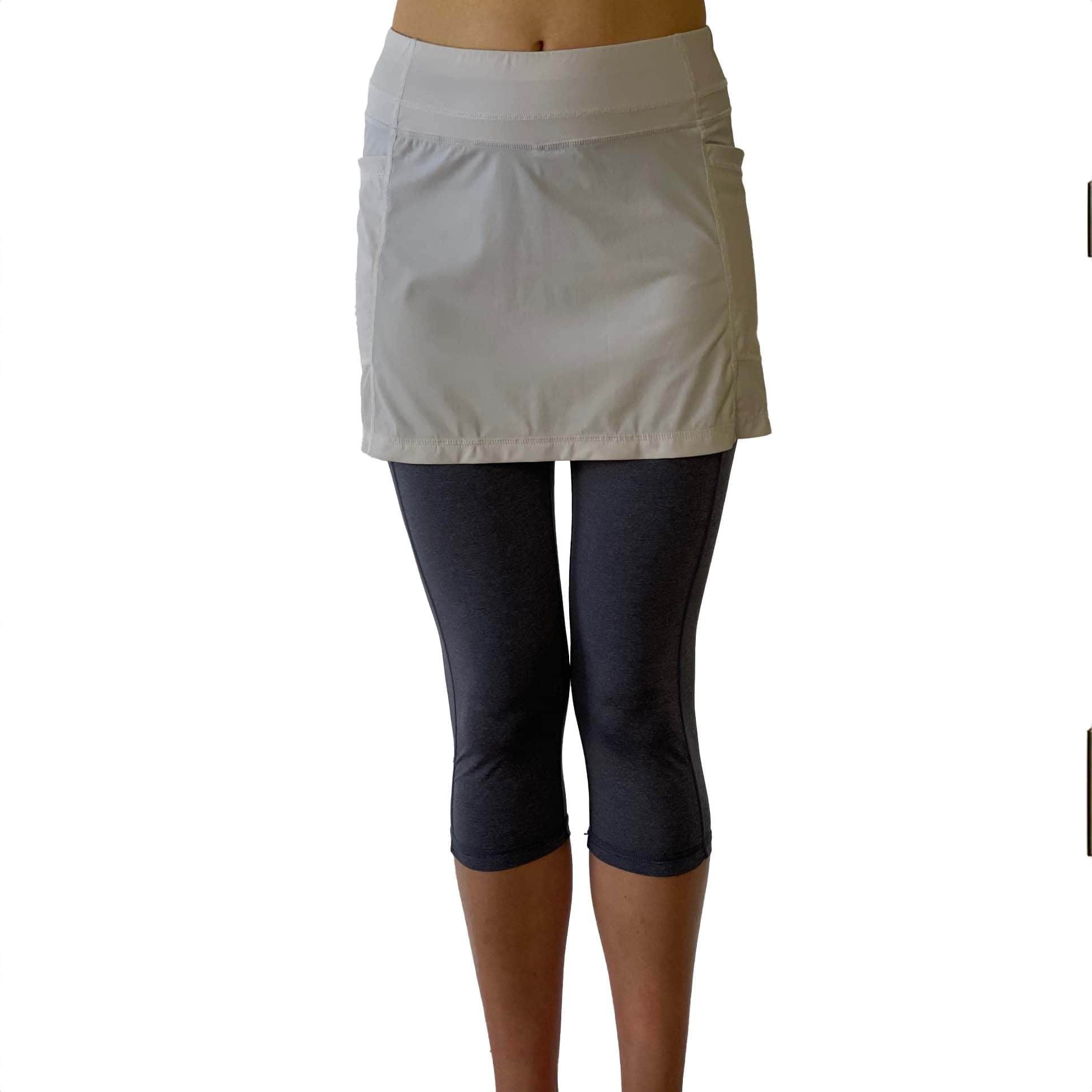 Waist down from front photo of 2-1 Skort Capris Leggings - Leggings are heather blue and attached skirt is white nylon.