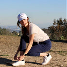 2-1 Classic Blueberry Ankle-Length Skirted Leggings worn by model about to go running- Sol Sister Sport