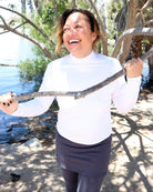 SOL Long-sleeve Smiling model wearing a T-Neck Shirt in White - Sol Sister Sport